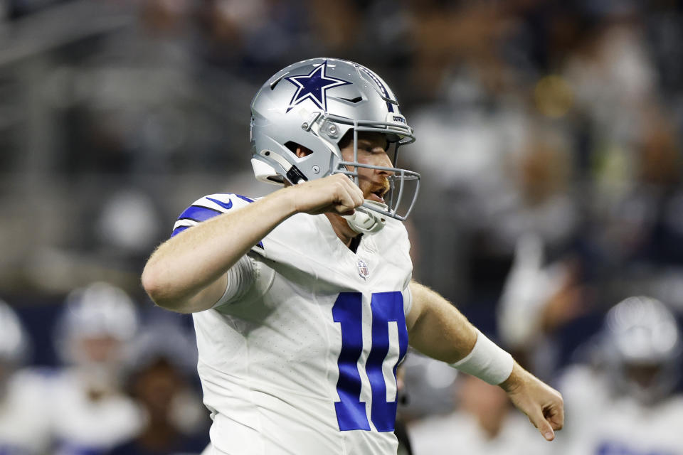 ARLINGTON, TEXAS - DECEMBER 22: Cooper Rush #10 of the Dallas Cowboys celebrates after a second quarter touchdown against the Tampa Bay Buccaneers at AT&T Stadium on December 22, 2024 in Arlington, Texas. (Photo by Ron Jenkins/Getty Images)