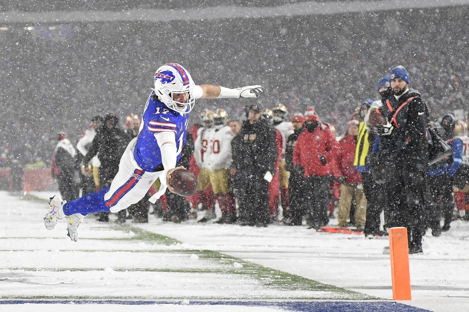 Buffalo Bills quarterback Josh Allen (17) dives for the end zone to score against the San Francisco 49ers during the second half of an NFL football game in Orchard Park, N.Y., Sunday, Dec. 1, 2024. (AP Photo/Adrian Kraus)