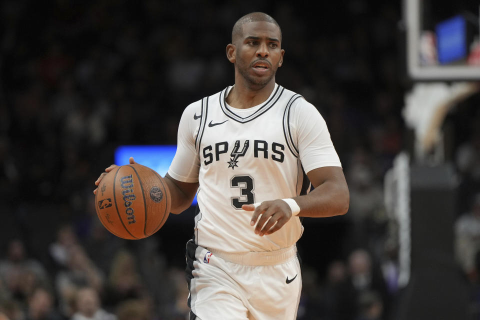 San Antonio Spurs guard Chris Paul (3) during the second half of an NBA basketball game against the Phoenix Suns, Tuesday, Dec. 3, 2024, in Phoenix. Phoenix won 104-93. (AP Photo/Rick Scuteri)