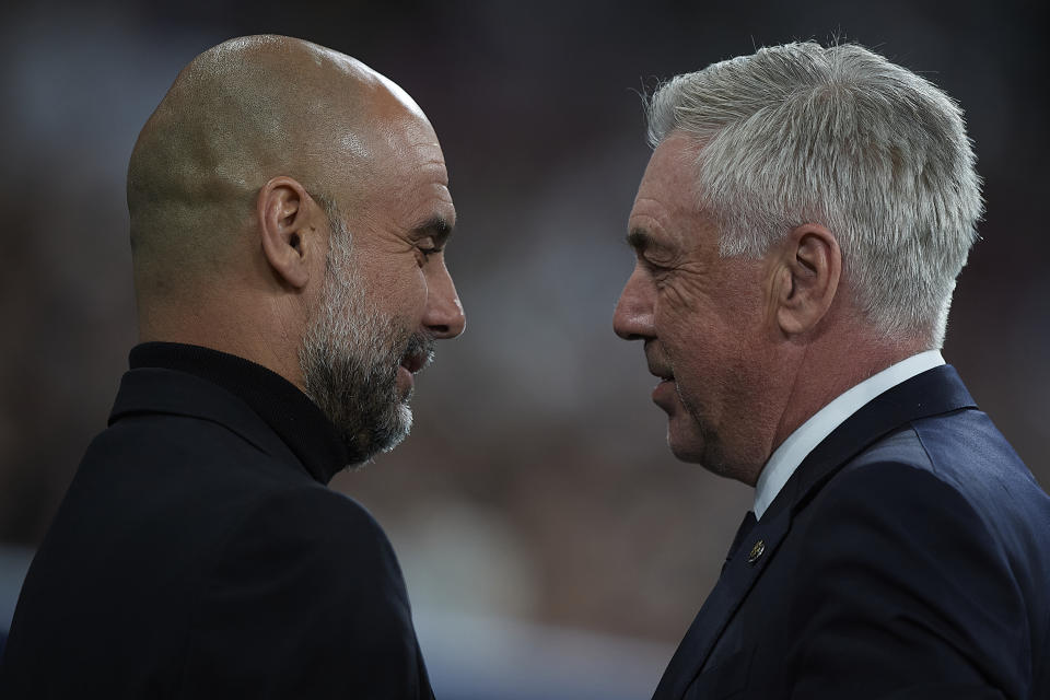 MADRID, SPAIN - APRIL 9: Carlo Ancelotti of Real Madrid CF and Pep Guardiola of Manchester City during the Quarter-final First Leg - UEFA Champions League match between Real Madrid CF and Manchester City at Estadio Santiago Bernabeu on April 9, 2024 in Madrid, Spain. (Photo by Pablo Morano/BSR Agency/Getty Images)