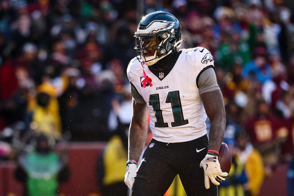 LANDOVER, MD - DECEMBER 22: A.J. Brown #11 of the Philadelphia Eagles celebrates after catching a pass for a touchdown against the Washington Commanders during the first half of the game at Northwest Stadium on December 22, 2024 in Landover, Maryland. (Photo by Scott Taetsch/Getty Images)