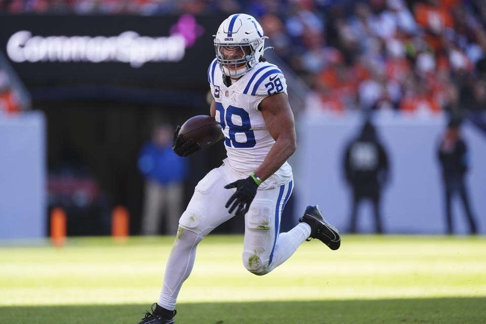 Indianapolis Colts running back Jonathan Taylor (28) in the first half of an NFL football game Sunday, Dec. 15, 2024, in Denver. (AP Photo/David Zalubowski)