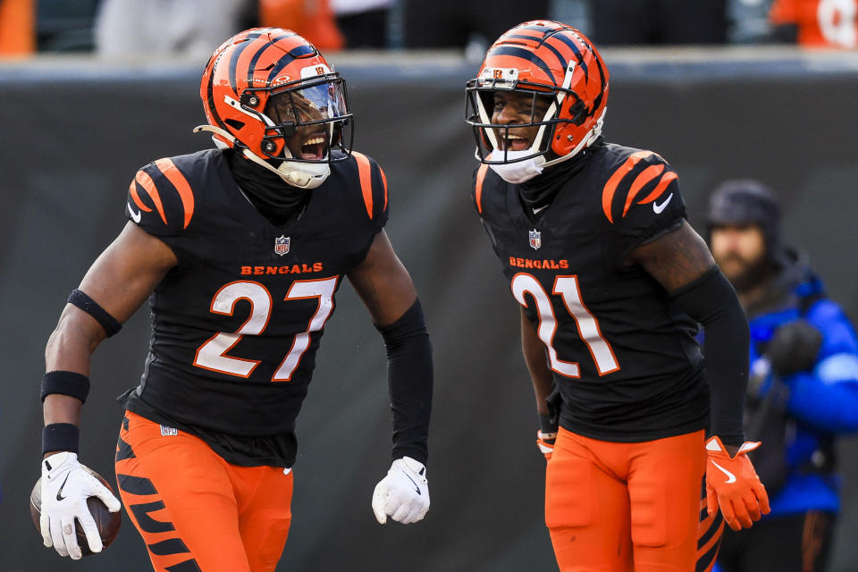 Dec 22, 2024; Cincinnati, Ohio, USA; Cincinnati Bengals safety Jordan Battle (27) reacts after a play with cornerback Mike Hilton (21) in the second half against the Cleveland Browns at Paycor Stadium. Mandatory Credit: Katie Stratman-Imagn Images