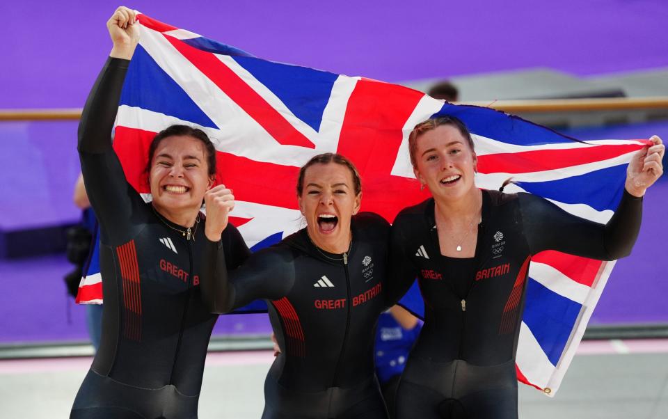 Great Britain's Sophie Capewell, Katy Marchant and Emma Finucane with Union flag