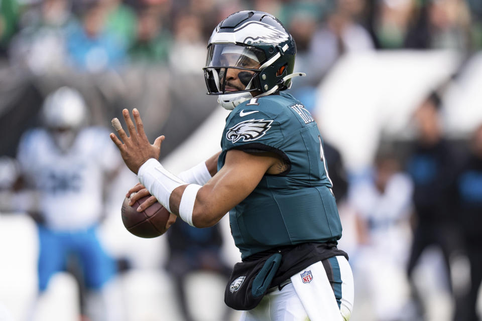 Philadelphia Eagles quarterback Jalen Hurts (1) in action during the NFL football game against the Carolina Panthers, Sunday, Dec. 8, 2024, in Philadelphia. The Eagles won 22-16. (AP Photo/Chris Szagola)