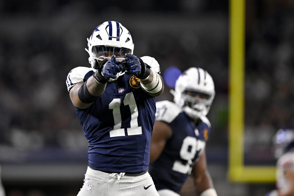 Dallas Cowboys linebacker Micah Parsons (11) celebrates after he sacks New York Giants quarterback Drew Lock during an NFL football game in Arlington, Texas, Thursday, Nov. 28, 2024. (AP Photo/Jerome Miron)