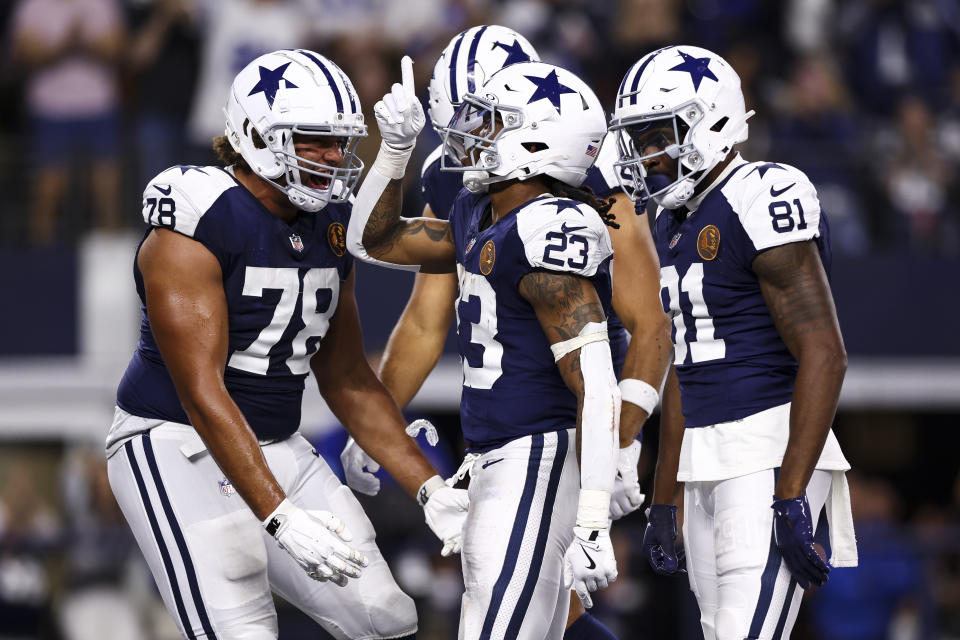 Rico Dowdle #23 of the Dallas Cowboys celebrates after scoring a touchdown during the second half of an NFL football game against the New York Giants at AT&T Stadium on November 28, 2024 in Arlington, Texas. (Photo by Kevin Sabitus/Getty Images)