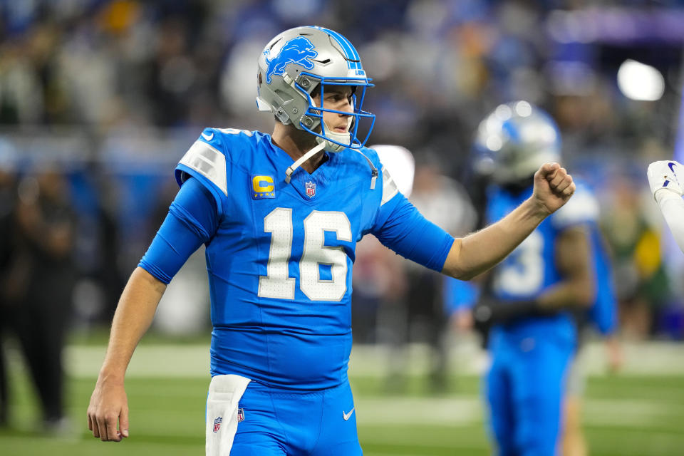 Detroit Lions quarterback Jared Goff (16) gestures before the start an NFL football game against the Green Bay Packers in Detroit, Thursday, Dec. 5, 2024. (AP Photo/Carlos Osorio)