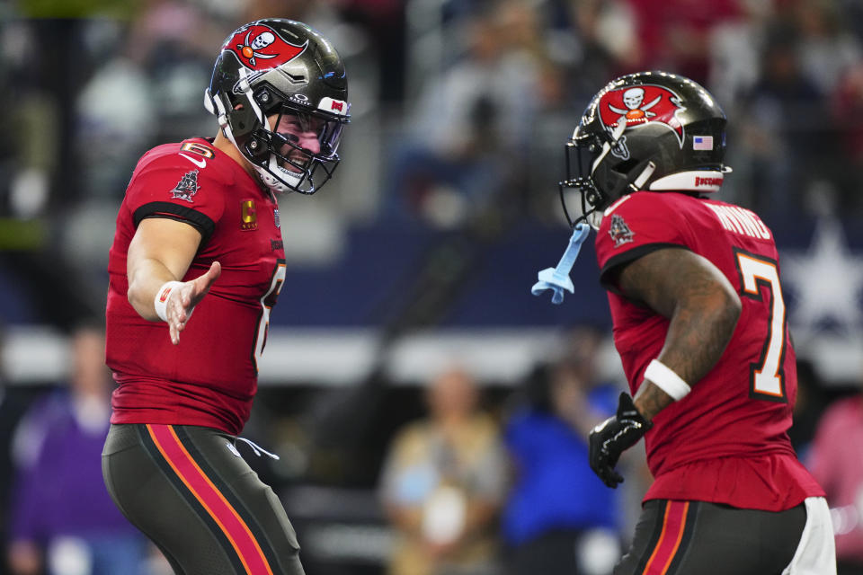 Baker Mayfield #6 of the Tampa Bay Buccaneers celebrates after scoring a touchdown against the Dallas Cowboys during an NFL football game at AT&T Stadium on December 22, 2024 in Arlington, Texas. (Photo by Cooper Neill/Getty Images)