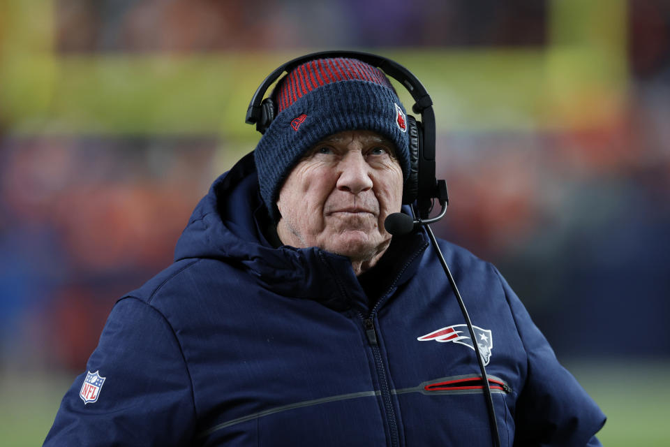 Denver, CO - December 24: New England Patriots head coach Bill Belichick walks the sidelines. The Patriots beat the Denver Broncos, 26-23. (Photo by Danielle Parhizkaran/The Boston Globe via Getty Images)