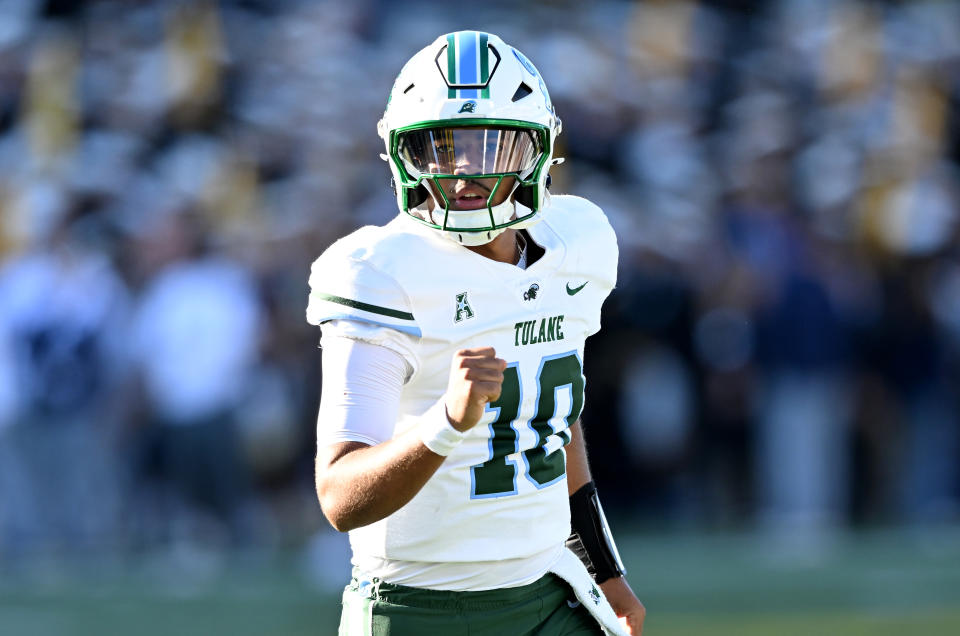 ANNAPOLIS, MARYLAND - NOVEMBER 16: Darian Mensah #10 of the Tulane Green Wave celebrates during the game against the Navy Midshipmen at Navy-Marine Corps Memorial Stadium on November 16, 2024 in Annapolis, Maryland. (Photo by G Fiume/Getty Images)