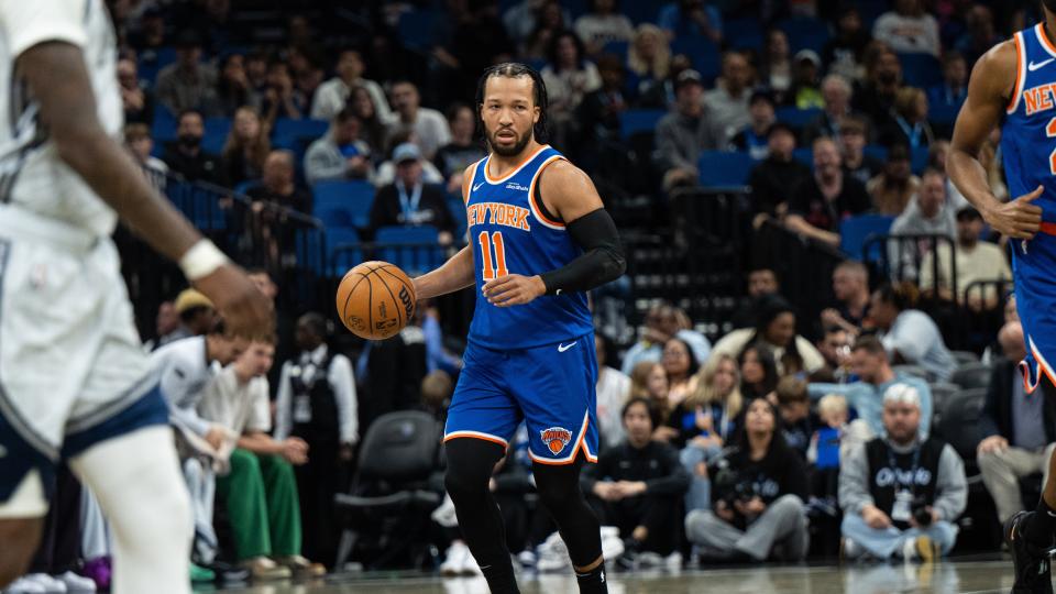 Dec 15, 2024; Orlando, Florida, USA; New York Knicks guard Jalen Brunson (11) dribbles the ball against the Orlando Magic in the first quarter at Kia Center. Mandatory Credit: Jeremy Reper-Imagn Images