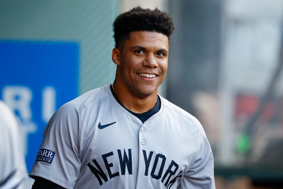 ANAHEIM, CALIFORNIA - MAY 28: Juan Soto #22 of the New York Yankees smiles in the dugout in the first inning during a game against the Los Angeles Angels at Angel Stadium of Anaheim on May 28, 2024 in Anaheim, California. (Photo by Brandon Sloter/Getty Images)