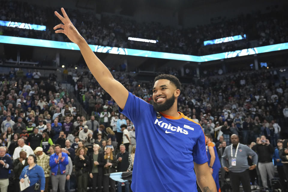 New York Knicks center Karl-Anthony Towns acknowledges the crowd before an NBA basketball game against the Minnesota Timberwolves, Thursday, Dec. 19, 2024, in Minneapolis. (AP Photo/Abbie Parr)