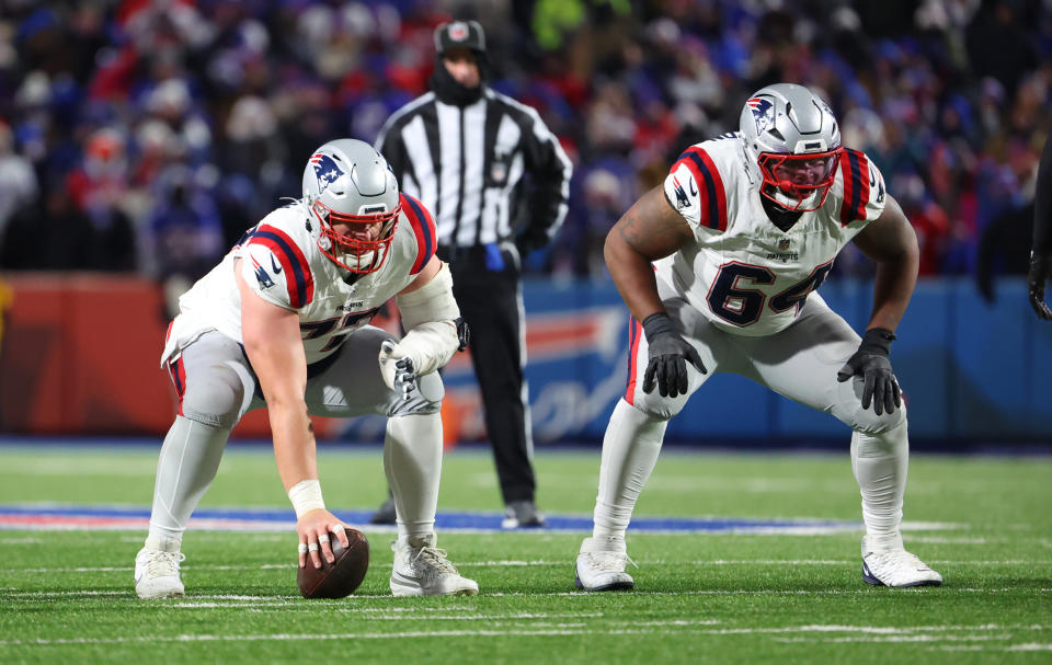 ORCHARD PARK, NEW YORK - DECEMBER 22: Layden Robinson #64 of the New England Patriots waits for the snap against the Buffalo Bills during a game at Highmark Stadium on December 22, 2024 in Orchard Park, New York. (Photo by Timothy T Ludwig/Getty Images)