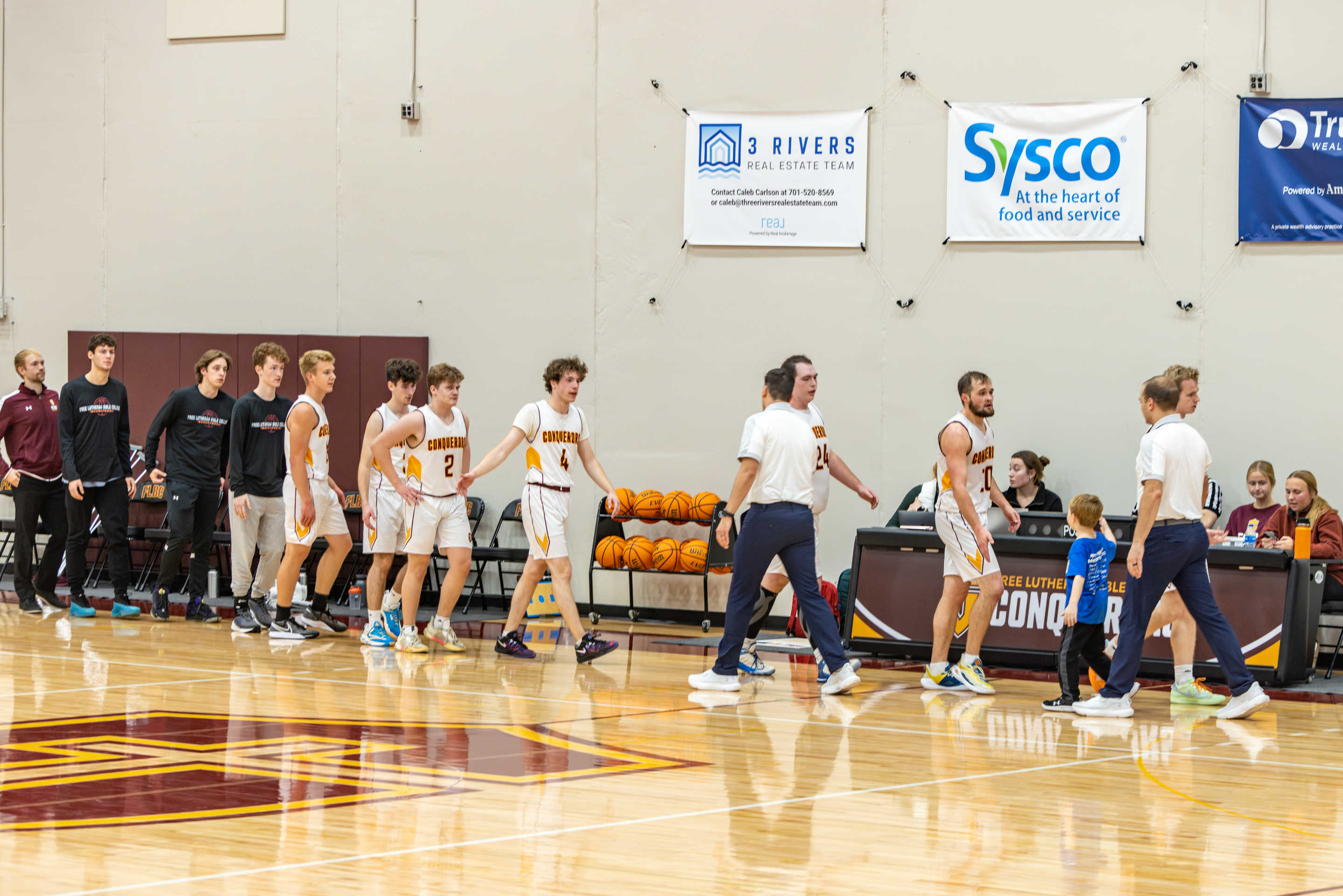 Free Lutheran Bible College lines up to shake hands after another loss. (Courtesy of Free Lutheran Bible College)