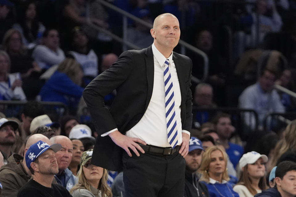 Kentucky head coach Mark Pope reacts during the second half of an NCAA college basketball game against Ohio State in the CBS Sports Classic, Saturday, Dec. 21, 2024, in New York. (AP Photo/Frank Franklin II)