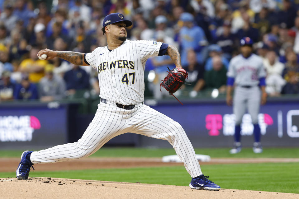 Frankie Montas split time with both the Reds and Brewers last season.