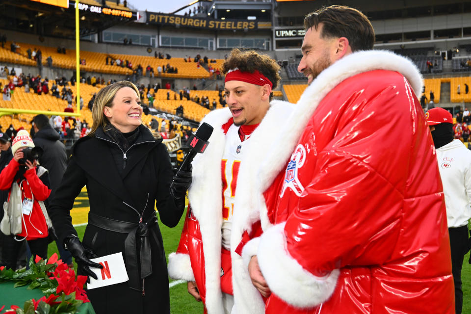 PITTSBURGH, PENNSYLVANIA - DECEMBER 25: Patrick Mahomes #15 and Travis Kelce #87 of the Kansas City Chiefs speaks with a NETFLIX reporter after the game against the Pittsburgh Steelers at Acrisure Stadium on December 25, 2024 in Pittsburgh, Pennsylvania. (Photo by Joe Sargent/Getty Images)