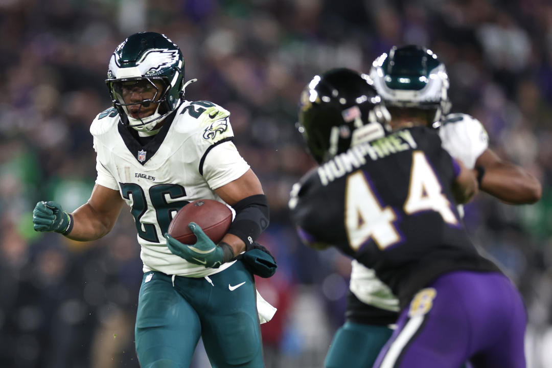 BALTIMORE, MARYLAND - DECEMBER 01: Saquon Barkley #26 of the Philadelphia Eagles runs the ball during the second quarter against the Baltimore Ravens at M&T Bank Stadium on December 01, 2024 in Baltimore, Maryland. (Photo by Patrick Smith/Getty Images)