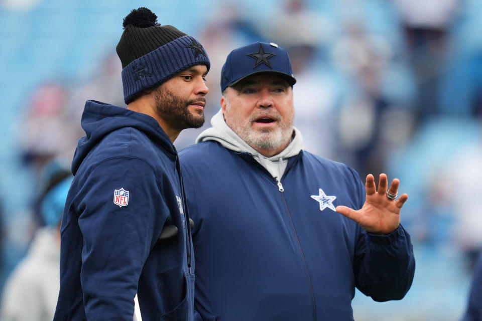 CHARLOTTE, NORTH CAROLINA - DECEMBER 15: Dak Prescott #4 and head coach Mike McCarthy of the Dallas Cowboys talk before the game against the Carolina Panthers at Bank of America Stadium on December 15, 2024 in Charlotte, North Carolina. (Photo by Grant Halverson/Getty Images)