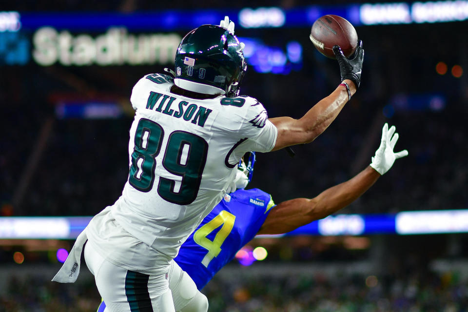 Nov 24, 2024; Inglewood, California, USA; Philadelphia Eagles wide receiver Johnny Wilson (89) misses catchiing a pass against Los Angeles Rams safety Tanner Ingle (34) during the second half at SoFi Stadium. Mandatory Credit: Gary A. Vasquez-Imagn Images