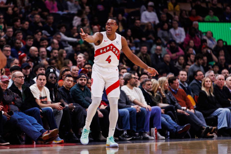 TORONTO, CANADA - DECEMBER 9: Scottie Barnes #4 of the Toronto Raptors reacts during first half of their NBA game against the New York Knicks at Scotiabank Arena on December 9, 2024 in Toronto, Canada. NOTE TO USER: User expressly acknowledges and agrees that, by downloading and or using this photograph, User is consenting to the terms and conditions of the Getty Images License Agreement. (Photo by Cole Burston/Getty Images)