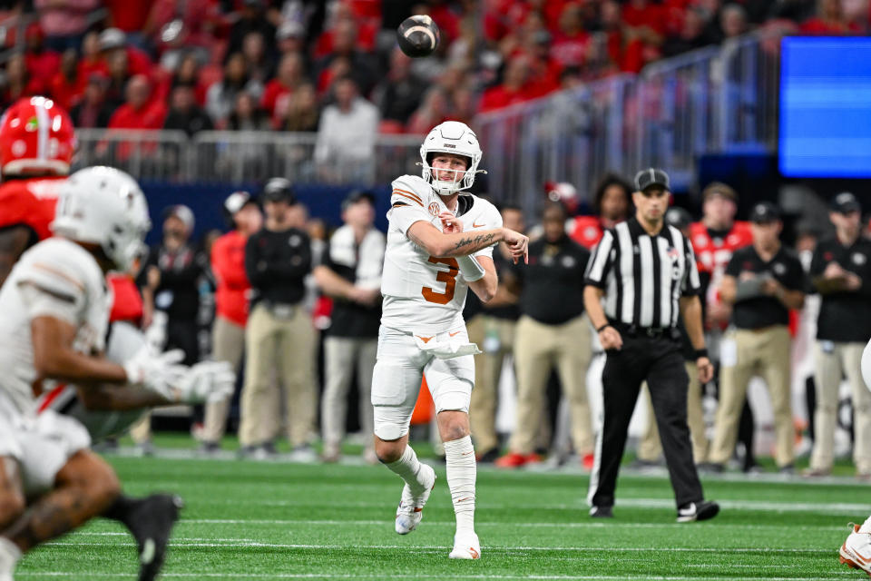 ATLANTA, GA DECEMBER 07: Texas quarterback Quinn Ewers (3) throws a pass during the SEC Championship game between the Texas Longhorns and the Georgia Bulldogs on December 7th, 2024 at Mercedes-Benz Stadium in Atlanta, GA. (Photo by Rich von Biberstein/Icon Sportswire via Getty Images)