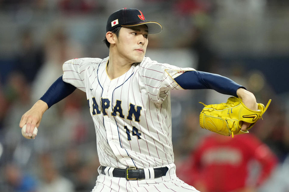 MIAMI, FLORIDA - MARCH 20: Roki Sasaki #14 of Team Japan pitches in the first inning against Team Mexico during the World Baseball Classic Semifinals at loanDepot park on March 20, 2023 in Miami, Florida. (Photo by Eric Espada/Getty Images)