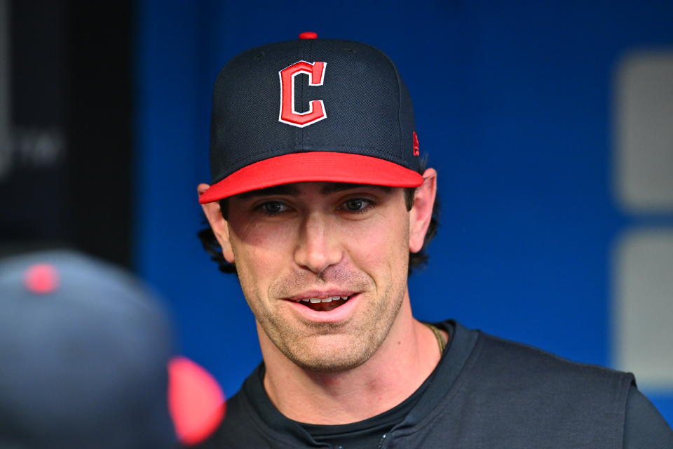 CLEVELAND, OHIO - APRIL 10: Pitcher Shane Bieber #57 of the Cleveland Guardians talks with teammates prior to the game against the Chicago White Sox at Progressive Field on April 10, 2024 in Cleveland, Ohio. (Photo by Jason Miller/Getty Images)