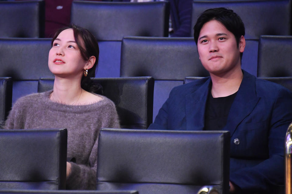 LOS ANGELES, CALIFORNIA - DECEMBER 08: Mamiko Tanaka and Shohei Ohtani attend a basketball game between the Los Angeles Lakers and Portland Trailblazers at Crypto.com Arena on December 08, 2024 in Los Angeles, California. NOTE TO USER: User expressly acknowledges and agrees that, by downloading and or using this photograph, User is consenting to the terms and conditions of the Getty Images License Agreement. (Photo by Allen Berezovsky/Getty Images)