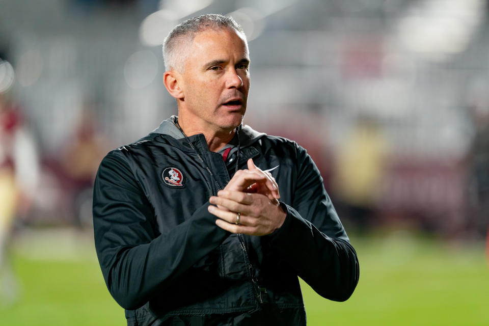 TALLAHASSEE, FL - NOVEMBER 30:Florida State Seminoles head coach Mike Norvell claps before a college football game between the Florida Gators and the Florida State Seminoles on November 30th, 2024 at Doak Campbell Stadium in Tallahassee, FL. (Photo by Chris Leduc/Icon Sportswire via Getty Images)