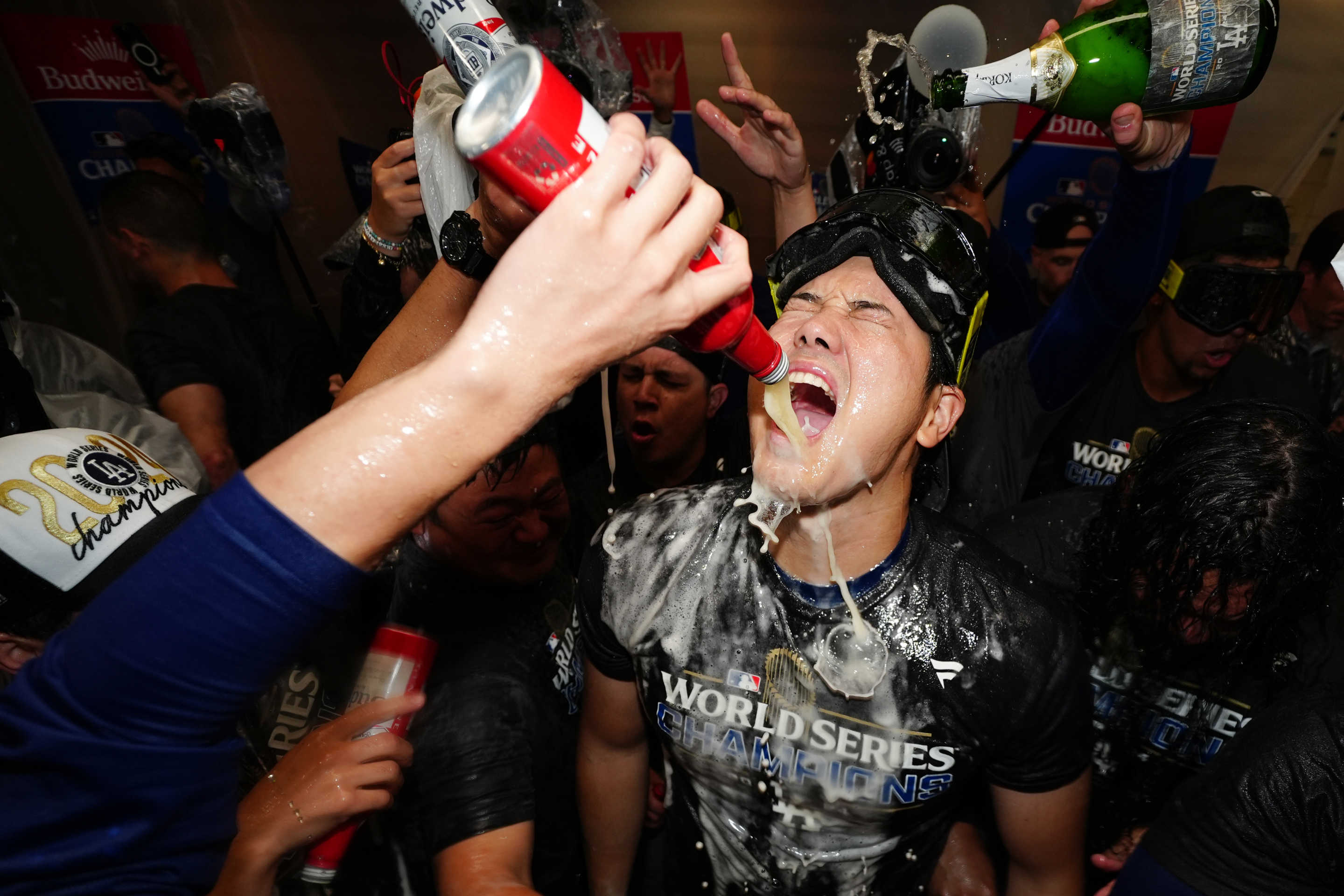 NEW YORK, NY - OCTOBER 30: Shohei Ohtani #17 of the Los Angeles Dodgers celebrates in the clubhouse after winning during Game 5 of the 2024 World Series presented by Capital One between the Los Angeles Dodgers and the New York Yankees at Yankee Stadium on Wednesday, October 30, 2024 in New York, New York. (Photo by Daniel Shirey/MLB Photos via Getty Images)