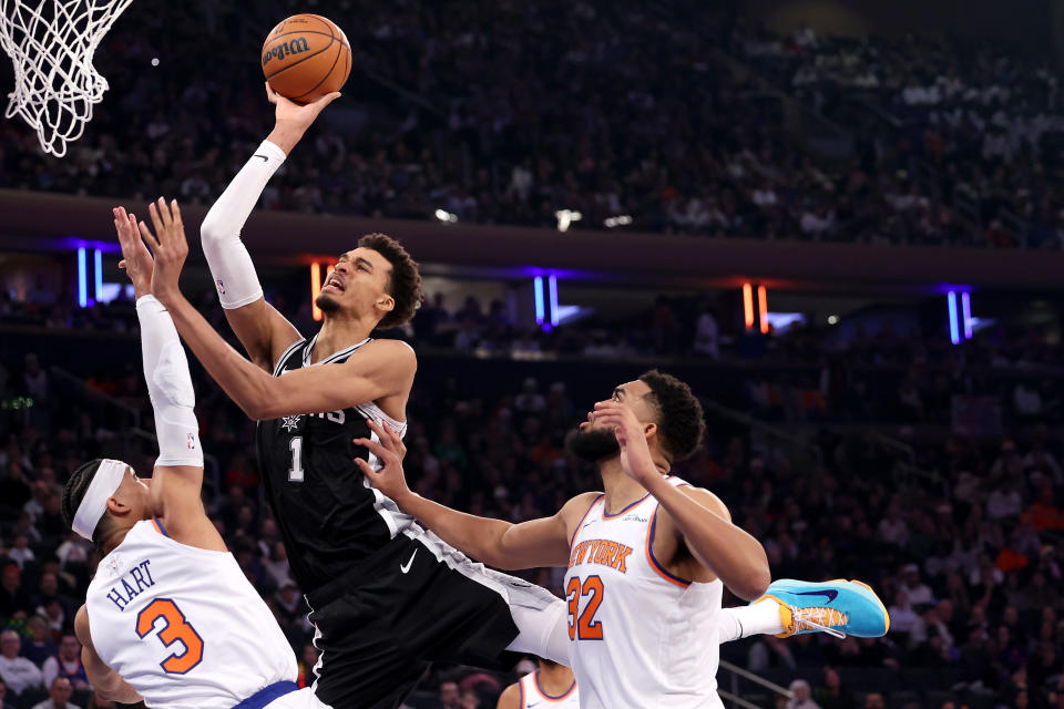 NEW YORK, NEW YORK - DECEMBER 25: Victor Wembanyama #1 of the San Antonio Spurs in action against the New York Knicks at Madison Square Garden on December 25, 2024 in New York City. NOTE TO USER: User expressly acknowledges and agrees that, by downloading and or using this photograph, User is consenting to the terms and conditions of the Getty Images License Agreement. (Photo by Luke Hales/Getty Images)