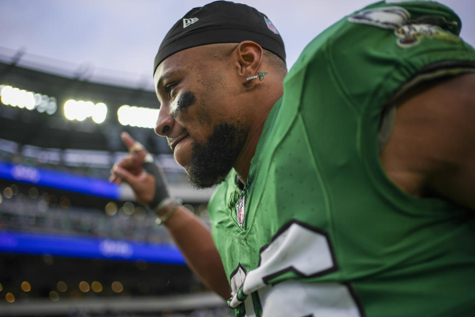 Saquon Barkley has a chance to break Eric Dickerson's 40-year-old NFL single-season rushing record. But should he even try? (AP Photo/Matt Slocum)