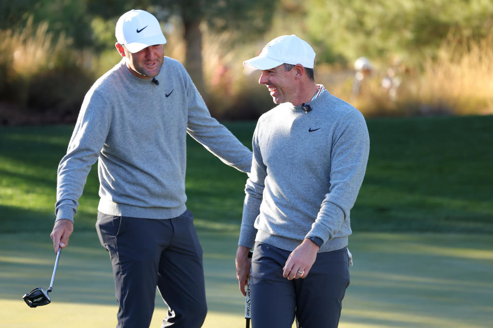 LAS VEGAS, NEVADA - DECEMBER 17: Scottie Scheffler (L) and Rory McIlroy of the PGA Tour talk during The Showdown: McIlroy and Scheffler v DeChambeau and Koepka at Shadow Creek Golf Course on December 17, 2024 in Las Vegas, Nevada. (Photo by Kevin C. Cox/Getty Images for The Showdown)