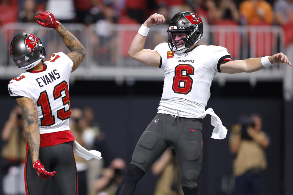 Baker Mayfield and Mike Evans can help their own pocketbooks, the Bucs' playoff chances and fantasy managers with a big finish to the season. (Photo by Todd Kirkland/Getty Images)