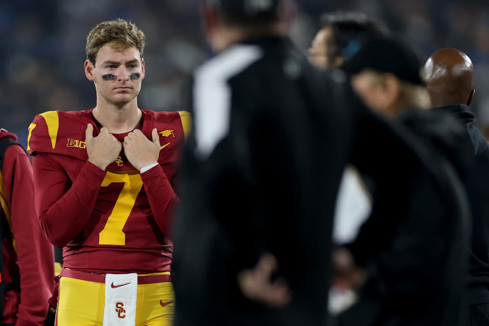 PASADENA, CALIFORNIA - NOVEMBER 23: Miller Moss #7 of the USC Trojans looks on from the sideline during the second half of a game against the UCLA Bruins at the Rose Bowl on November 23, 2024 in Pasadena, California. (Photo by Sean M. Haffey/Getty Images)