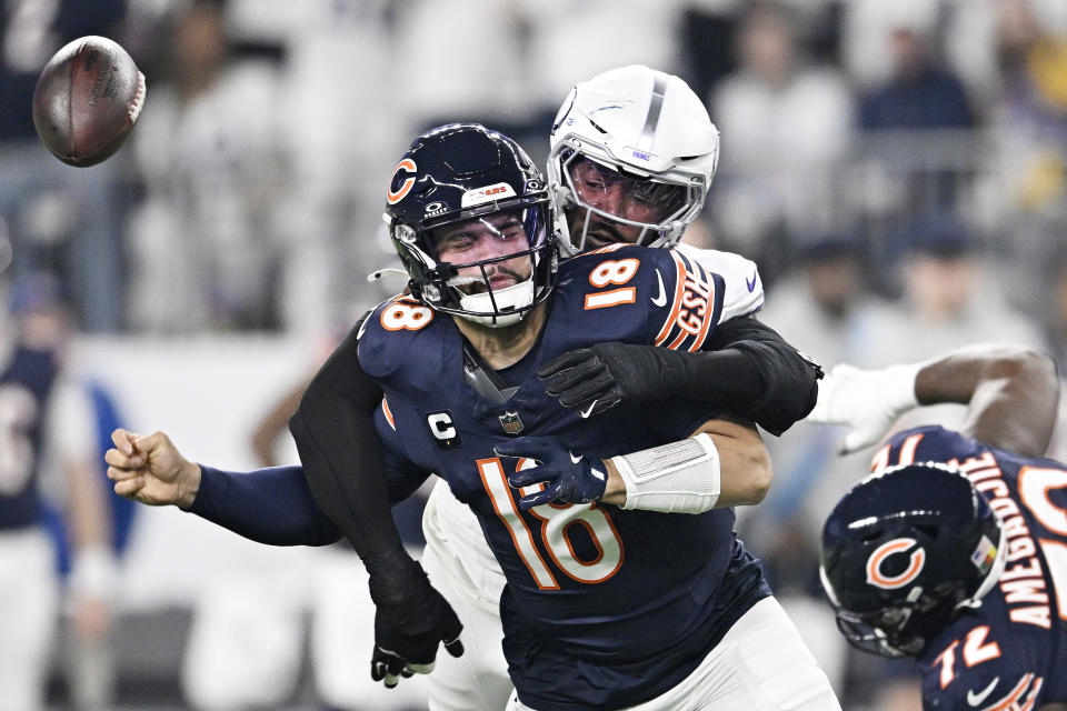 Jonathan Greenard of the Minnesota Vikings strips sacks Caleb Williams of the Chicago Bears during the Vikings' win on Monday night. (Photo by Stephen Maturen/Getty Images)