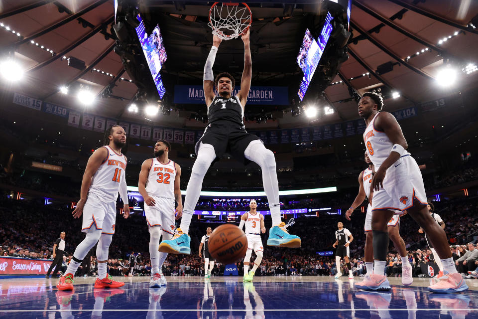 NEW YORK, NEW YORK - DECEMBER 25: Victor Wembanyama #1 of the San Antonio Spurs dunks the ball against the New York Knicks during the second quarter at Madison Square Garden on December 25, 2024 in New York City. NOTE TO USER: User expressly acknowledges and agrees that, by downloading and or using this photograph, User is consenting to the terms and conditions of the Getty Images License Agreement. (Photo by Luke Hales/Getty Images)