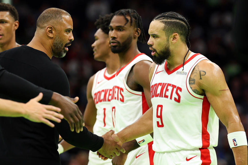 MINNEAPOLIS, MINNESOTA - NOVEMBER 26: Head coach Ime Udoka interacts with Dillon Brooks #9 of the Houston Rockets in the third quarter against the Minnesota Timberwolves during the Emirates NBA Cup at Target Center on November 26, 2024 in Minneapolis, Minnesota. The Rockets defeated the Timberwolves 117-111 in overtime. NOTE TO USER: User expressly acknowledges and agrees that, by downloading and or using this photograph, User is consenting to the terms and conditions of the Getty Images License Agreement. (Photo by David Berding/Getty Images)