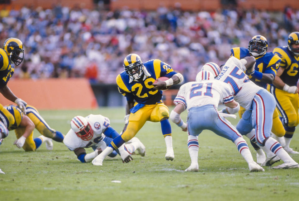 Dickerson carves through the Oilers’ defense. (David Madison/Getty Images)