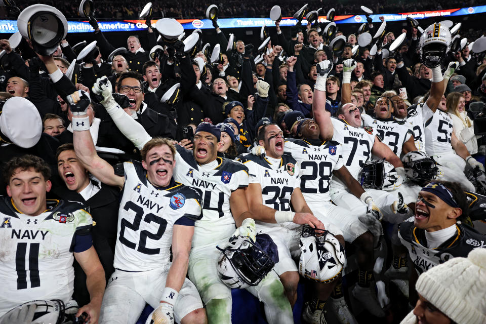 The Midshipmen celebrate after winning the 125th edition of 