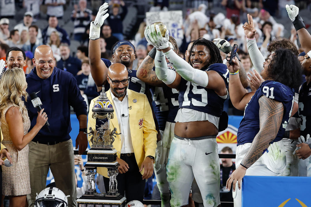 GLENDALE, AZ - DECEMBER 31: Defensive End Amin Vanover #15 of the Penn State Nittany Lions holds the Fiesta Bowl trophy after the Penn State Nittany Lions versus Boise State Broncos College Football Playoff Quarterfinal at the Vrbo Fiesta Bowl on December 31,2024, at State Farm Stadium in Glendale, AZ. (Photo by Kevin Abele/Icon Sportswire via Getty Images)