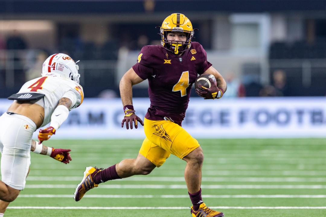 ARLINGTON, TX - DECEMBER 07: Arizona State Sun Devils running back Cam Skattebo (#4) runs up field during the Big 12 championship football game between the Arizona State Sun Devils and the Iowa State Cyclones on December 7, 2024 at AT&T Stadium in Arlington, TX. (Photo by Matthew Visinsky/Icon Sportswire via Getty Images)