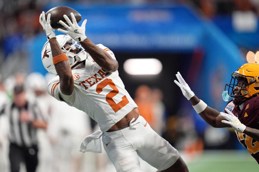 Jan 1, 2025; Atlanta, GA, USA; Texas Longhorns wide receiver Matthew Golden (2) makes a catch against the Arizona State Sun Devils during the second half of the Peach Bowl at Mercedes-Benz Stadium. Mandatory Credit: Dale Zanine-Imagn Images