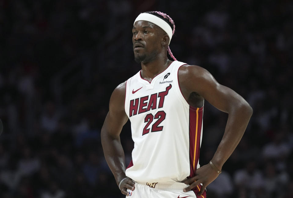 Miami Heat forward Jimmy Butler (22) stands on the court during the second half of an NBA basketball game against the New Orleans Pelicans, Wednesday, Jan. 1, 2025, in Miami. (AP Photo/Lynne Sladky)