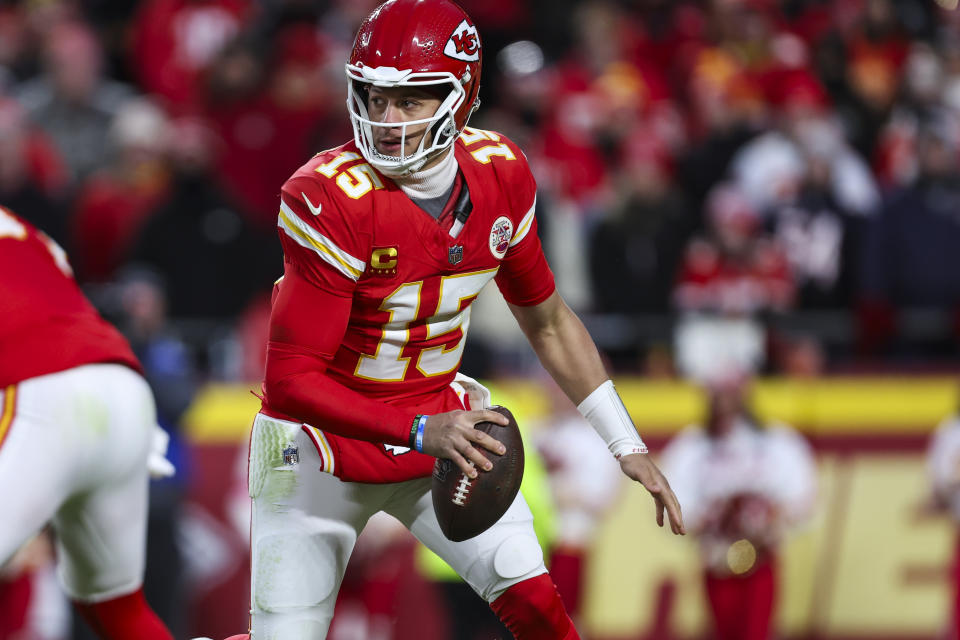 KANSAS CITY, MISSOURI - JANUARY 18: Patrick Mahomes #15 of the Kansas City Chiefs scrambles out of the pocket during an NFL football AFC divisional playoff game against the Houston Texans at GEHA Field at Arrowhead Stadium on January 18, 2025 in Kansas City, Missouri. (Photo by Perry Knotts/Getty Images)