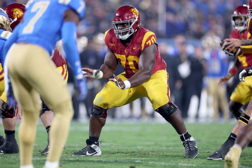 PASADENA, CALIFORNIA - NOVEMBER 23: Emmanuel Pregnon #70 of the USC Trojans.