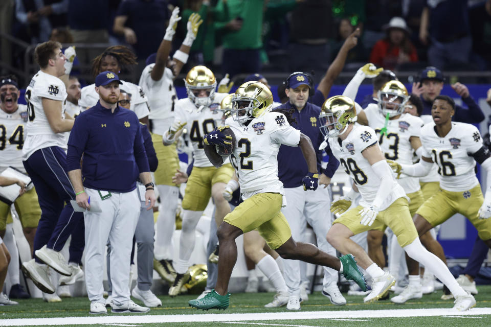 Notre Dame special teams coach Marty Biagi looks on while Jayden Harrison returns the second-half kickoff for a touchdown on Thursday. (Sean Gardner/Getty Images)